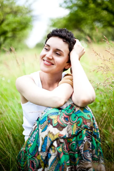 Cute girl on fresh grass — Stock Photo, Image