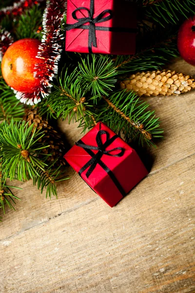Fir tree with pinecones, decorations and apples — Stock Photo, Image