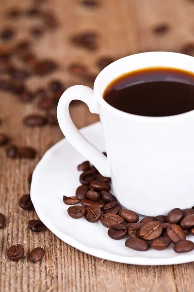 Cup of coffee and beans — Stock Photo, Image