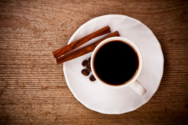 Cup of coffee and cinnamon — Stock Photo, Image