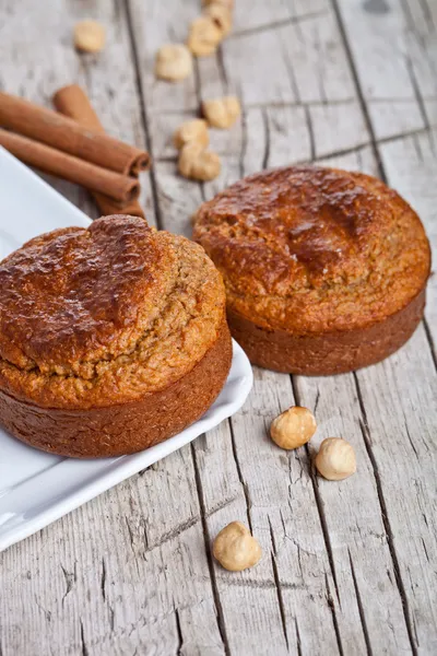 Fresh buns with hazelnuts and cinnamon — Stock Photo, Image