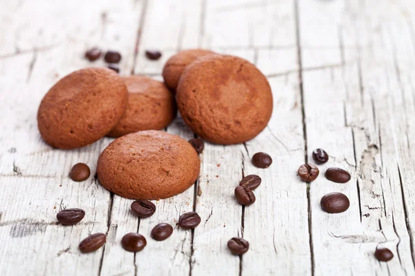 Chocolate cookies and coffee beans — Stock Photo, Image