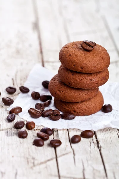 Chocolate cookies and coffee beans — Stock Photo, Image