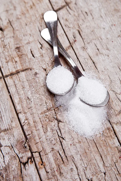 Sugar in two spoons — Stock Photo, Image