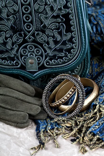 Vintage bag, leather gloves, bracelets and scarf — Stock Photo, Image