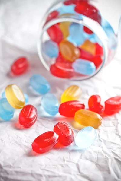 Colorful candies in glass jar — Stock Photo, Image