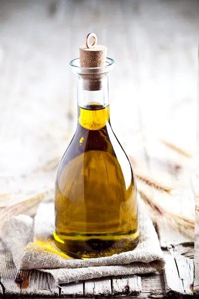 Fresh olive oil in bottle — Stock Photo, Image