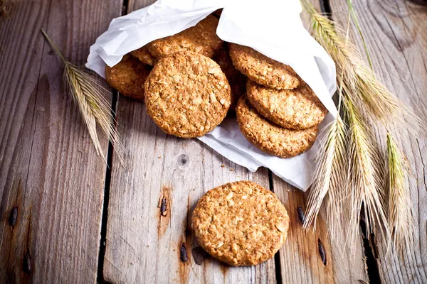 Fresh crispy oat cookies and ears — Stock Photo, Image
