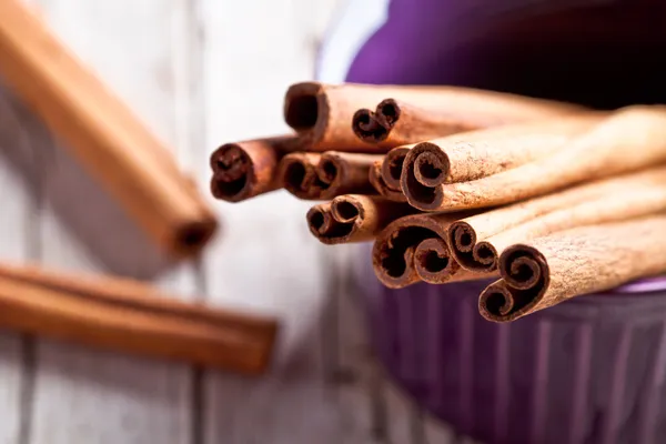 Cinnamon sticks in bowl — Stock Photo, Image