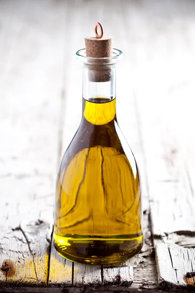 Fresh olive oil in bottle — Stock Photo, Image