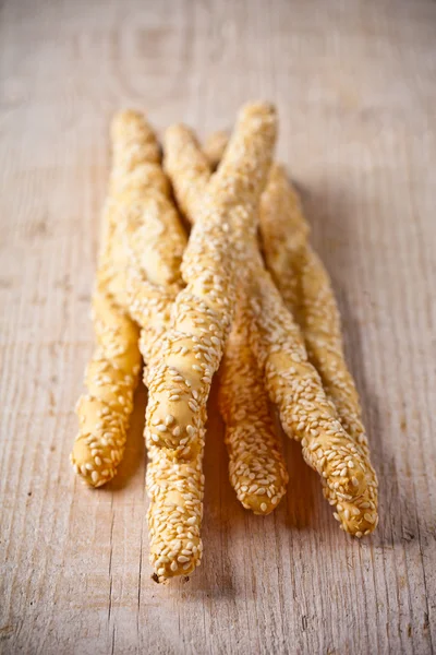 Bread sticks grissini with sesame seeds — Stock Photo, Image