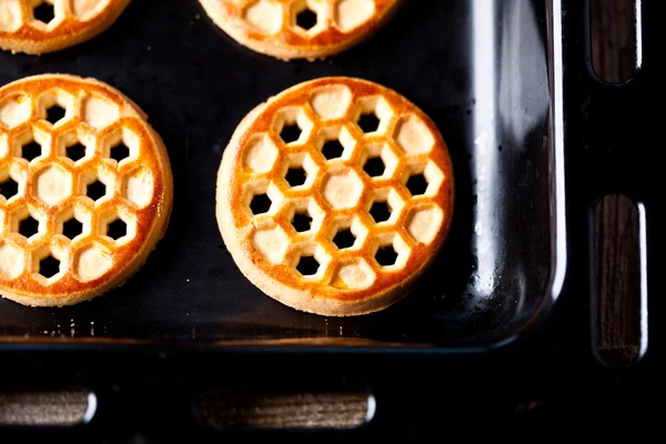 Honey cookies on baking sheet — Stock Photo, Image