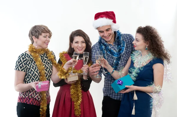 Three girls and the guy on a New Year's holiday — Stock Photo, Image