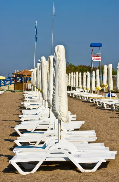 A number of plank beds and umbrellas — Stock Photo, Image