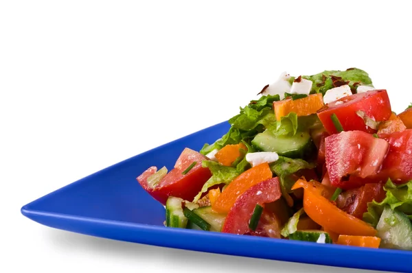 La ensalada griega, plato azul oscuro — Foto de Stock