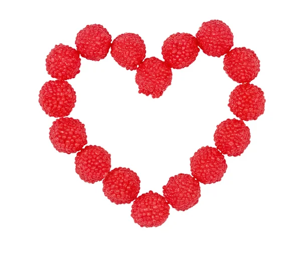 Bright heart made of raspberry berries — Stock Photo, Image
