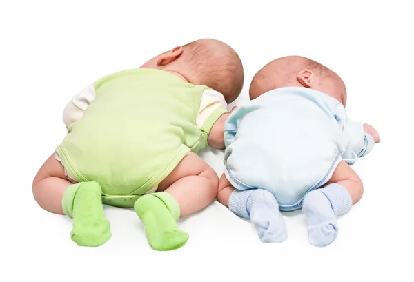 Pair of twins lying on a stomach — Stock Photo, Image