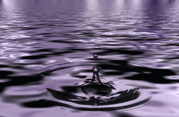 Drop and ripples in the water Stock Picture