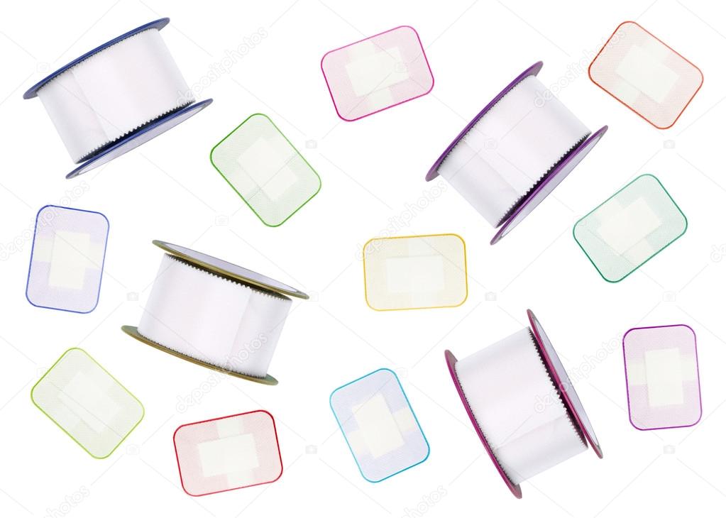 colorful plasters and bandages isolated in white background