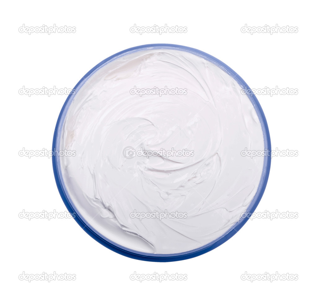 Opened plastic container with cream on a white background.
