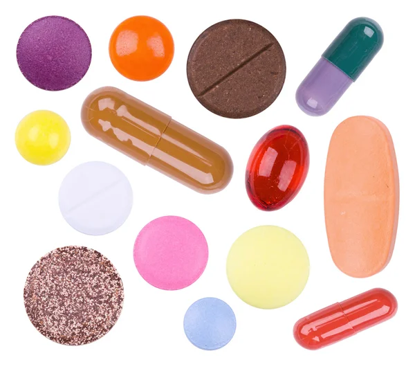 Ljust flerfärgade tabletter på vita — Stockfoto