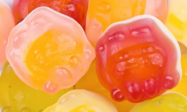 Caramelle alla frutta multicolore tutti i tipi, sfondo — Foto Stock