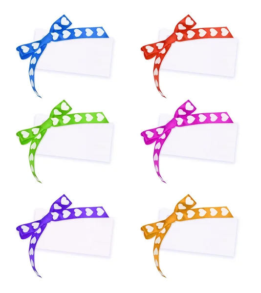 Cards with colors bow on white — Stock Photo, Image