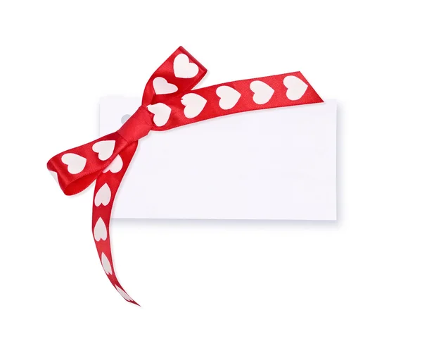 Card and bow with ornament on white — Stock Photo, Image