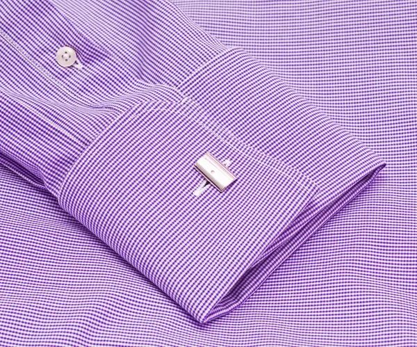 Mouw van een shirt met een manchetknoop close-up — Stockfoto