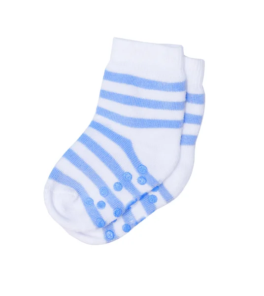 Children's socks with a rubber sole that the child didn't slide on a floor — Stock Photo, Image