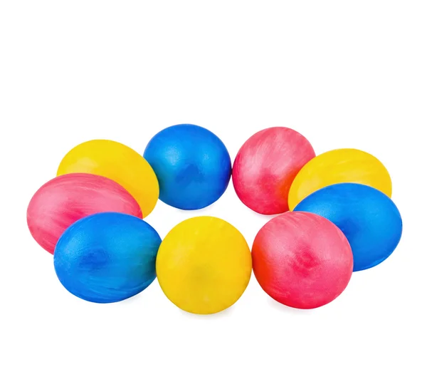Bright multi-colored eggs on a white background — Stock Photo, Image