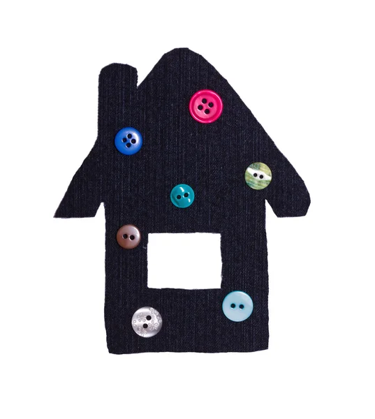 Small house from a fabric and buttons on white the isolated — Stock Photo, Image
