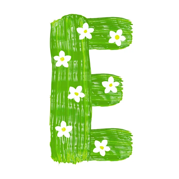 Las letras verdes E dibujadas por pinturas con flor blanca — Foto de Stock