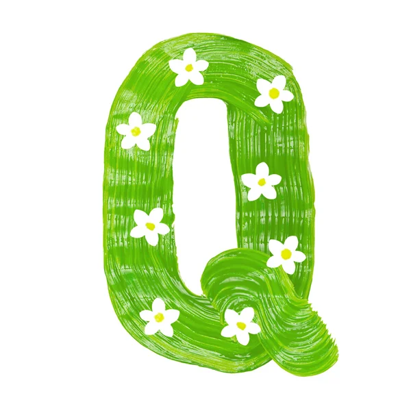 The green letters Q drawn by paints with white blossom — Stock Photo, Image