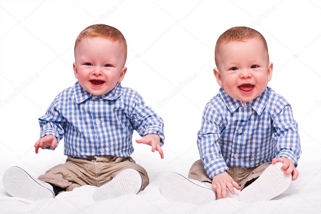 Twins boys sit isolated