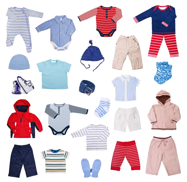 Coleção de roupas infantis em um fundo branco Fotos De Bancos De Imagens