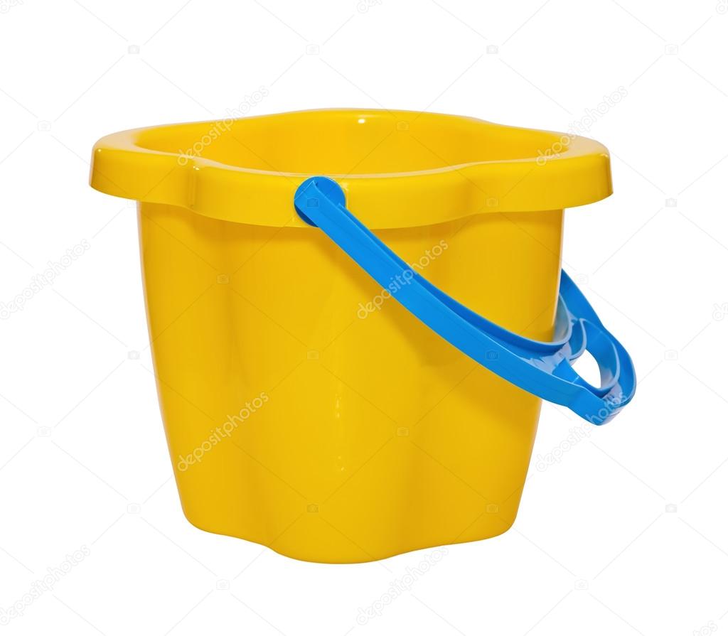 Bright children's bucket on the white