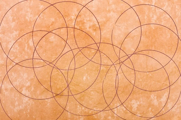 Círculos padrão em um papel velho — Fotografia de Stock