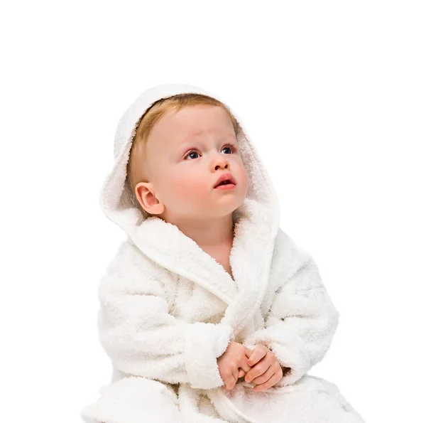 El niño de un año de edad en bata en un backgrou gris —  Fotos de Stock