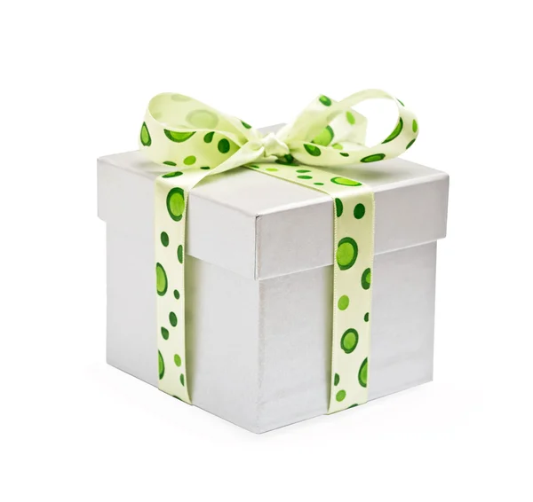 El regalo atado por una cinta verde —  Fotos de Stock
