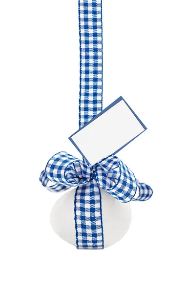 The Easter egg hangs on a ribbon — Stock Photo, Image