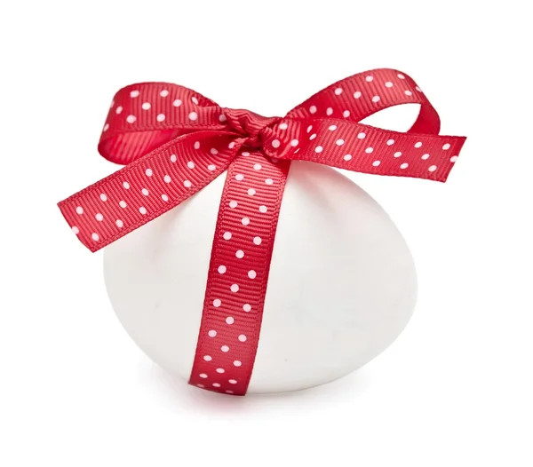 White egg red ribbon and bow — Stock Photo, Image