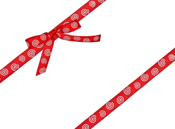 Fita vermelha com um ornamento branco — Fotografia de Stock
