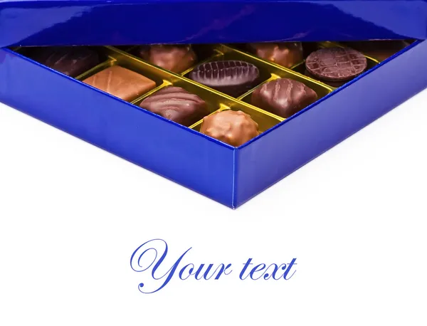 Uma caixa azul de chocolates — Fotografia de Stock