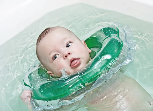 Newborn taking a bath — Stock Photo, Image