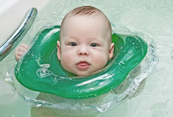 Newborn taking a bath — Stock Photo, Image