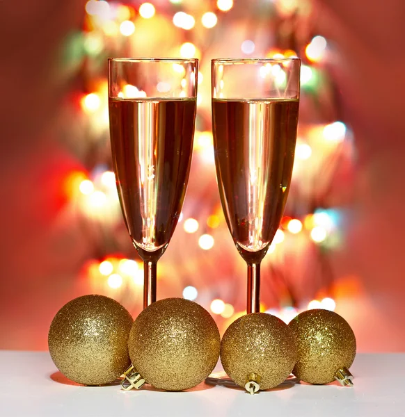 Christmas toys, wine glasses — Stock Photo, Image