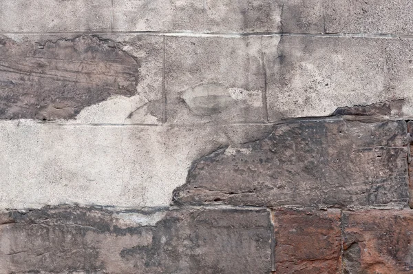 Старая каменная стена с шелухой . — стоковое фото