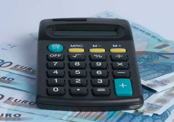 Calculator with paper money. — Stock Photo, Image