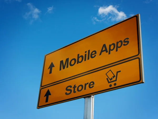 Mobile Apps Verkehrszeichen mit Einkaufswagen und Smartphone. — Stockfoto